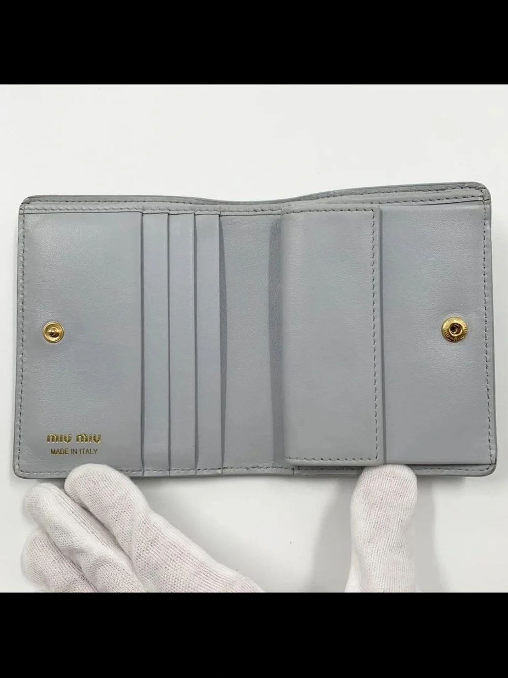Miu Miu Light Blue Embossed Logo Compact Wallet with Gold Hardware